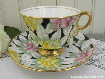 Vintage Adderley Stylized Pink and Yellow Roses on Black Chintz Teacup and Saucer Online