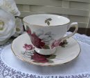 Vintage Red White and Pink Rose Teacup and Saucer For Sale