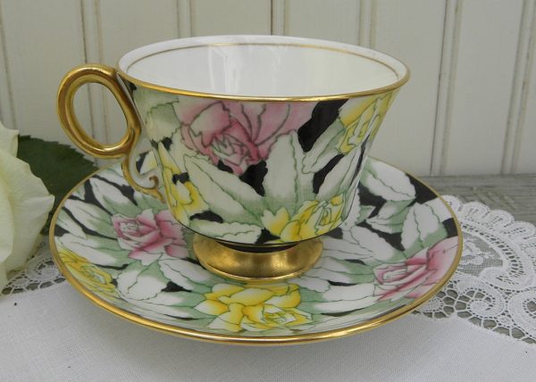 Vintage Adderley Stylized Pink and Yellow Roses on Black Chintz Teacup and Saucer Online