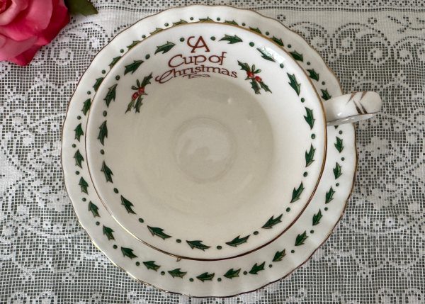 A Cup of Christmas Tea Teacup and Saucer by Warren Hanson For Sale