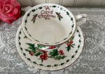 A Cup of Christmas Tea Teacup and Saucer by Warren Hanson For Sale