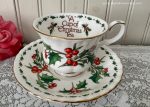 A Cup of Christmas Tea Teacup and Saucer by Warren Hanson For Sale